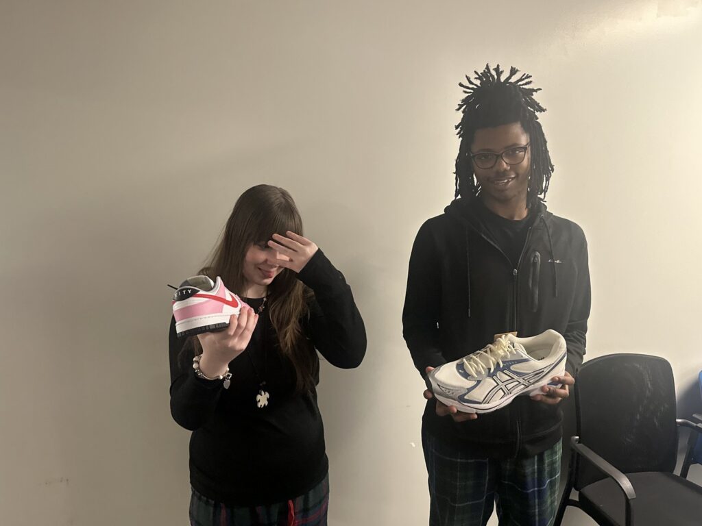 Students who won the Perfect Attendance Customized Shoe raffle receive their prizes!